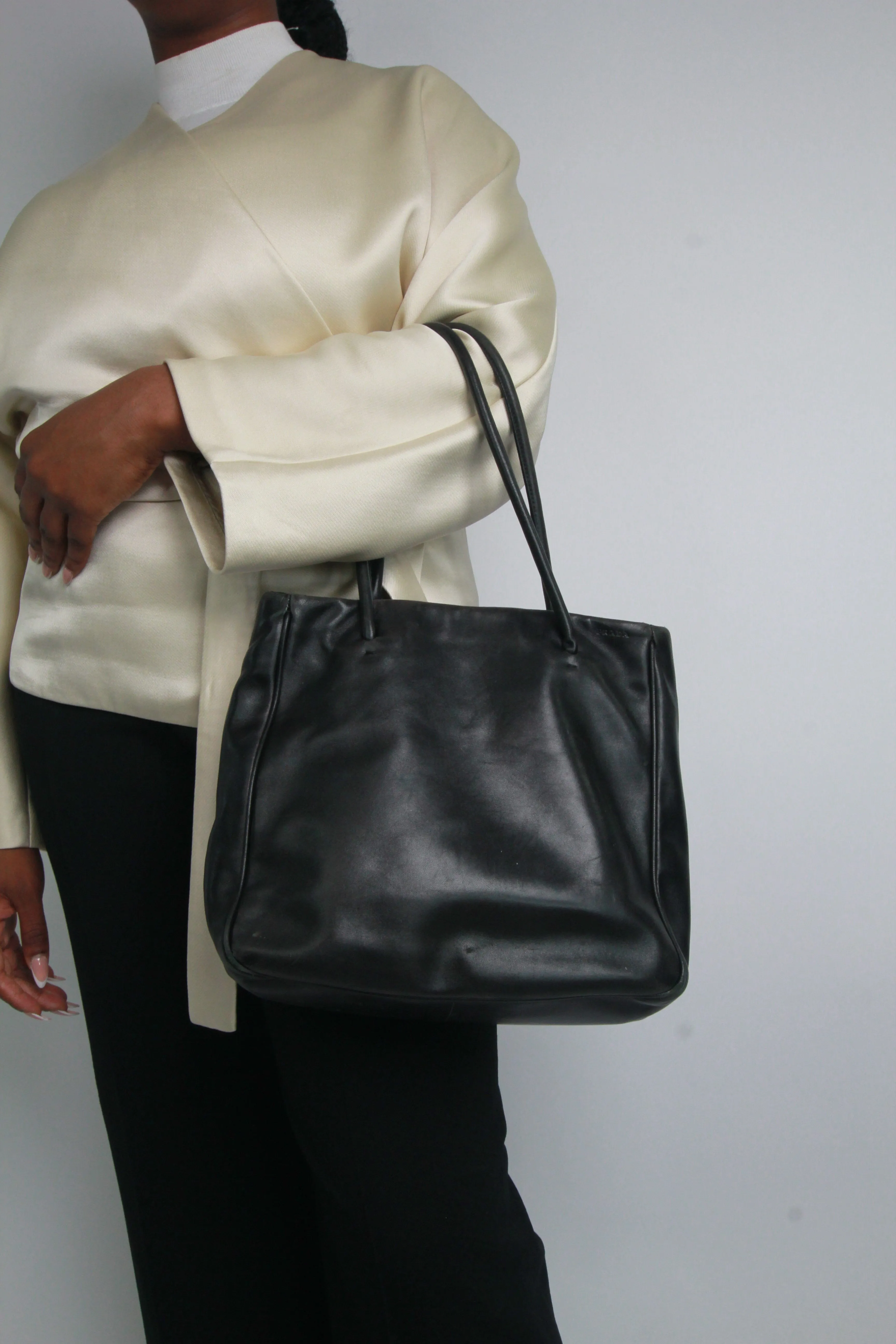 Black leather top handle bag